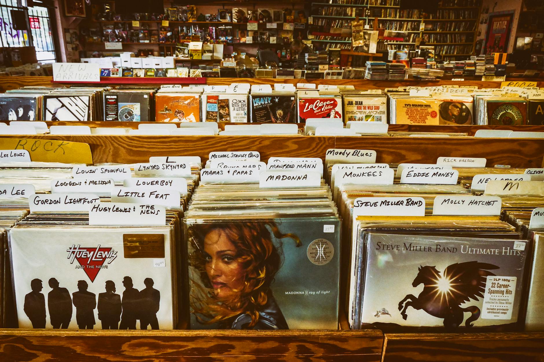 Discover a vintage vinyl records collection in a retro music store, capturing nostalgia.